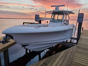 Install IMM Boat lift and dolphin piling