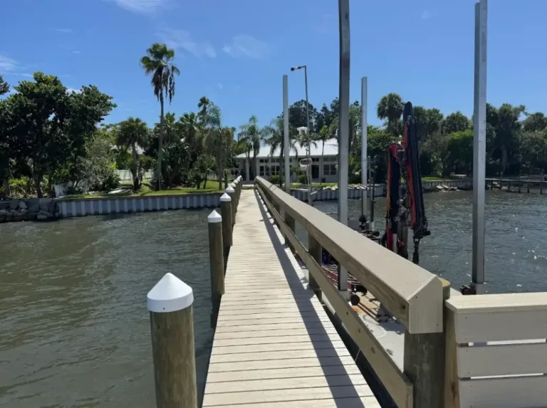 Wooden dock pilings installed by DC Marine Construction in Melbourne FL
